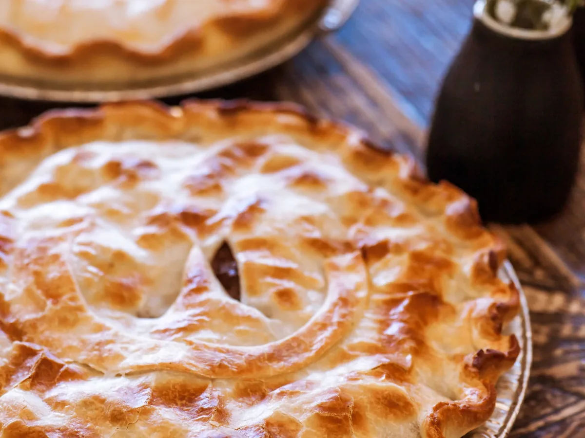 Apple pies dusted with sugar.